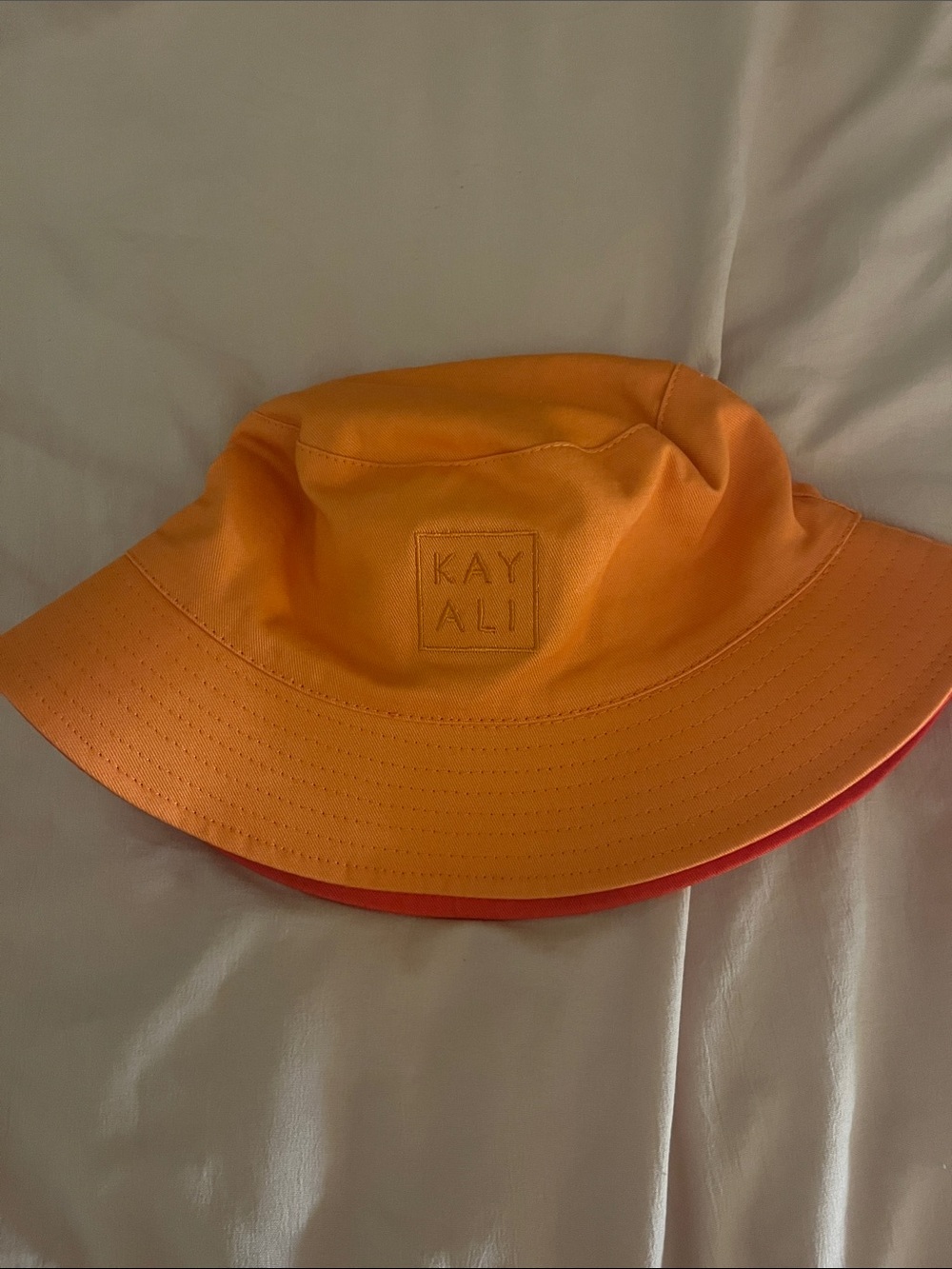 KAYALI Women's Orange Reversible Bucket Hat